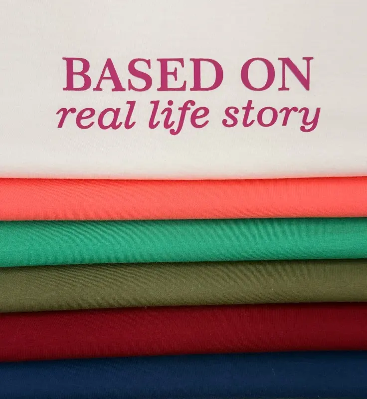 تیشرت زنانه نخ پنبه یقه گرد رنگی طرح Based on Real Life Story | آلما شاپ